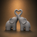 FIGURA DECORATIVA ELEFANTES AMOR